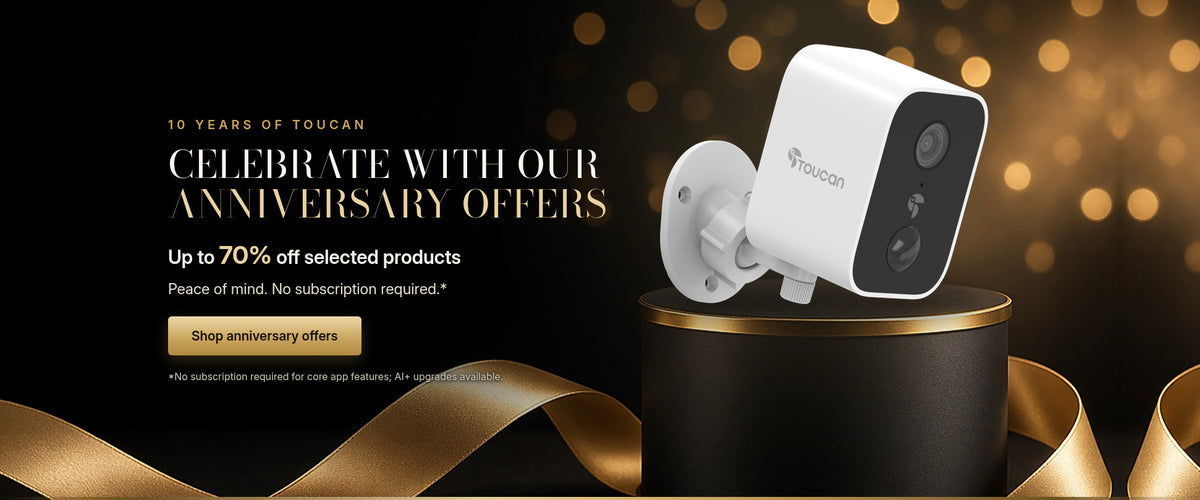 10 Years of Toucan anniversary offers: up to 70% off selected products. Toucan security camera on a black and gold pedestal.